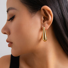 Load image into Gallery viewer, Ins style metal heart ear buckle with simple design and U-shaped smooth surface earrings